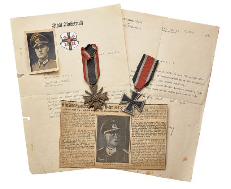German Third Reich attributed Iron Cross and War Merit Cross.  Good 1939 Iron Cross 2nd Class, suspension ring number 22 (unu
