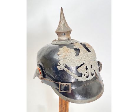 Imperial German WW1 Prussian State Pickelhaube  A good example polished black leather skull, with grey metal fittings. Comple