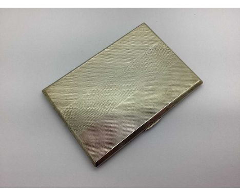 A Chester Hallmarked Silver Cigarette Case, 1946, allover engine turned, gilt lined and engraved inside "To Dad with Love 192