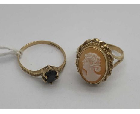 A 9ct Gold Carved Cameo Panel Ring, the portrait of a lady within a decorative twist frame (finger size M), a 9ct gold stone 