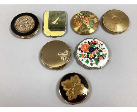 An Assortment of Vintage and Later Gilt Tone Compacts, to include Stratton with bow decoration, Art Deco style with engine tu