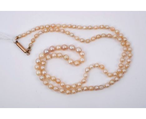 Antique cultured pearl necklace with a single string of graduated cultured pearls on barrel clasp, 45cm CONDITION REPORT Poss