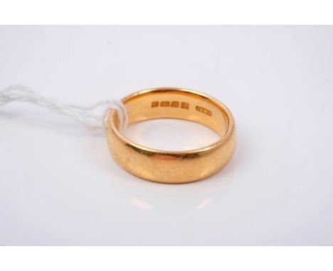 Gold (22ct) wedding ring (London 1922).  Ring size approximately T½ CONDITION REPORT Good condition with wear commensurate wi