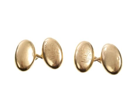 Pair early 20th century Tiffany & Co. gold (18ct) cufflinks with oval polished panels engraved with a family crest depicting 