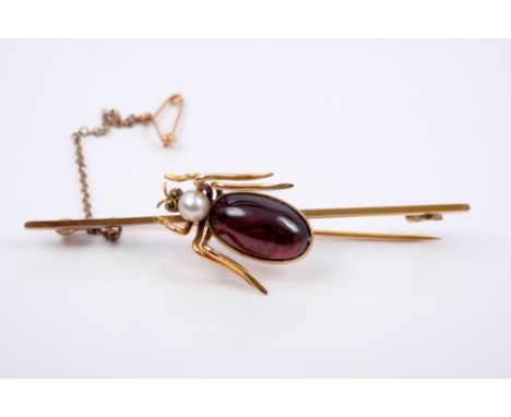 Edwardian novelty insect brooch, the spider with oval cabochon garnet body and cultured pearl head and green stone eyes, moun