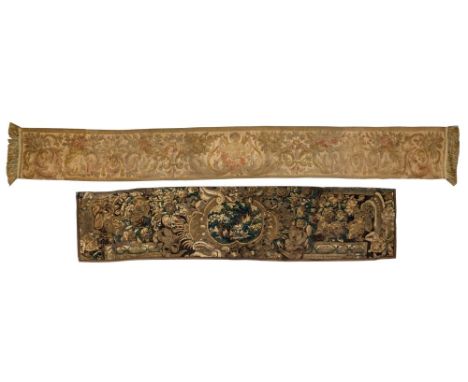 17th / 18th century Continental tapestry border fragment, with central landscape cartouche and scrolling floral ground, 186cm