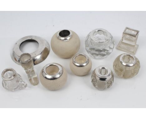 Collection of six early 20th century silver and white metal mounted cut and moulded glass vesta / match strikers, together wi
