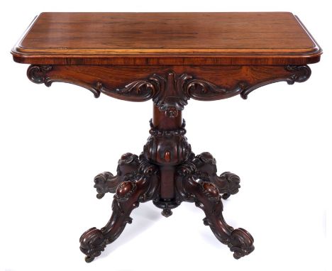 Early Victorian rosewood card table, rounded rectangular hinged top, enclosing circular baize-lined playing surface with well