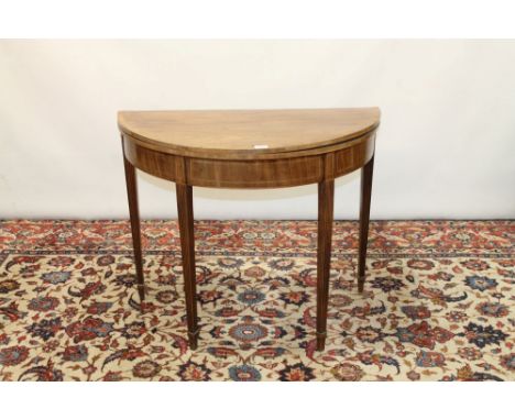 George III inlaid mahogany demi-lune card table on square table reeded legs terminating on spade feet, 91cm x 44.5cm