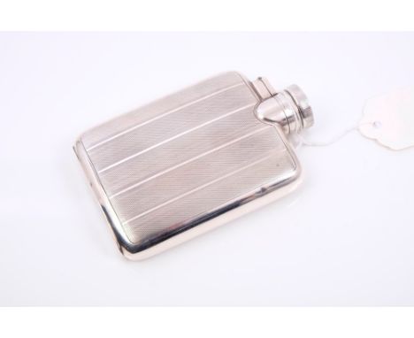 1920s silver spirit flask of small proportions, with engine-turned decoration and presentation inscription, hinged cover with