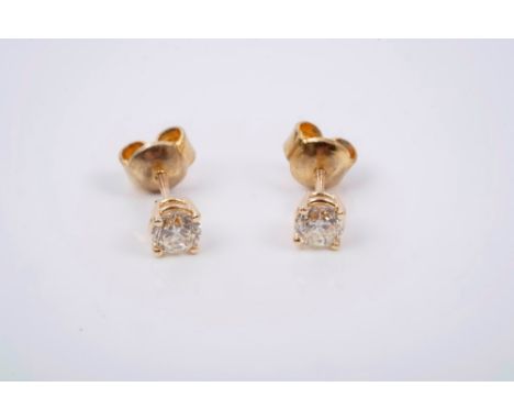 Pair diamond single stone stud earrings, each with a brilliant cut diamond estimated to weigh approximately 0.80 carats in to