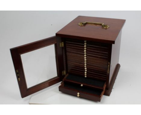 Good quality late Victorian mahogany table-top collectors' cabinet with gilt brass swing carrying handle, glazed door enclosi