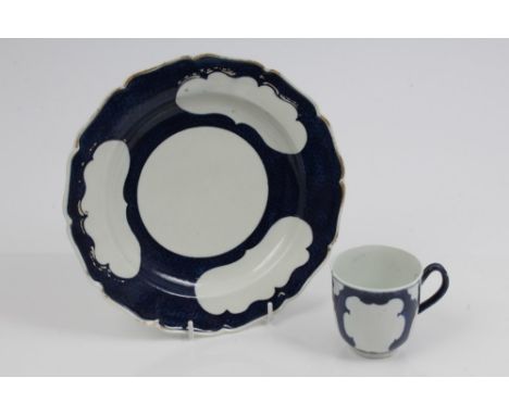 18th century Worcester coffee cup and plate, both with plain white cartouches on blue scale ground - underglazed blue seal ma