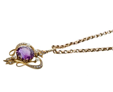 Edwardian amethyst and seed pearl heart-shape pendant with a central mixed cut amethyst measuring 12.5mm diameter, in an open