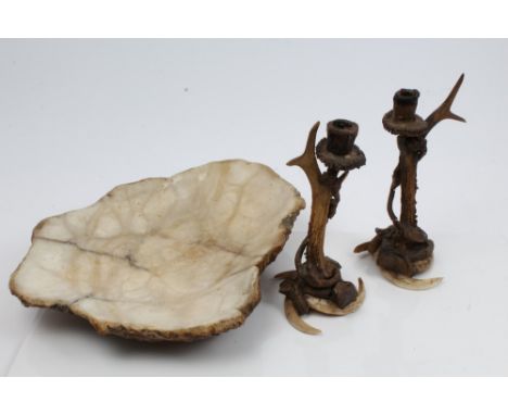 Pair of decorative hunting lodge antler and boar's tusk candlesticks with applied leaf ornament, 27cm high, together with a g