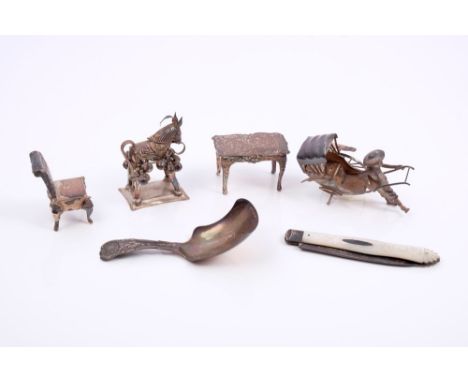 Collection of novelty silver including a miniature table (Import mark Chester 1900), a miniature chair (Import mark London 19