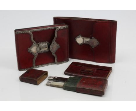 Two fine quality 18th century silver mounted red leather purses, silver mounted folding fruit knife and non-matching fork in 