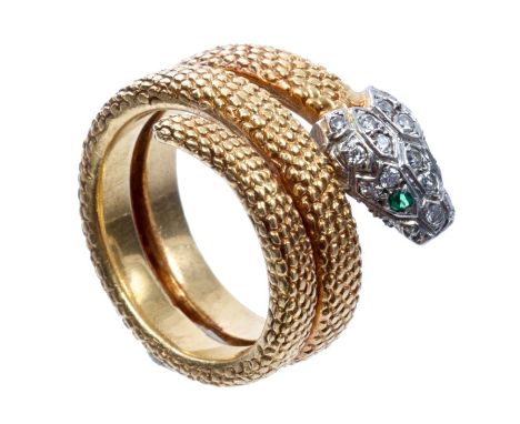 Fine Cartier snake ring, the pavé set diamond head with emerald eyes and coiled gold body with textured gold scales, signed -