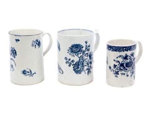 18th century Lowestoft porcelain tankard with peaked scroll handle, underglazed blue transfer floral sprays and butterflies, 