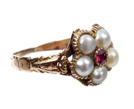 Regency ruby and seed pearl forget-me-not ring with a central ruby surrounded by five half pearls in yellow metal setting wit