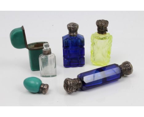 Collection of 19th century glass and ceramic scent flasks including three Bohemian coloured glass and silver mounted scent fl