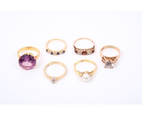 Six gold and gem set dress rings - various CONDITION REPORT Faux Alexandrite / purple stone ring - shank stamped '22k', weigh