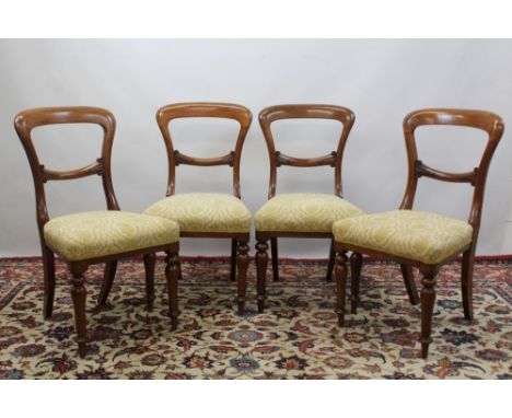 Set of four Victorian mahogany dining chairs, stamped - 'Hewitson & Milner, Tottenham Court Road', with shaped bar back and f