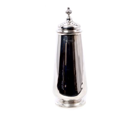 Edwardian silver sugar caster of tapering form, with detachable pierced domed cover and flower-head finial on circular base (