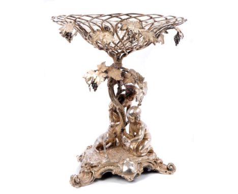 19th century silver plated table centre fruit bowl in the manner of Elkington, with basket top festooned with bunches of grap