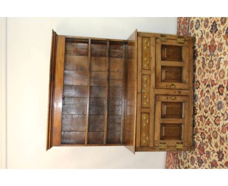 Oak high dresser, the boarded rack with moulded cornice, the base having three frieze drawers and two fielded panel cupboard 