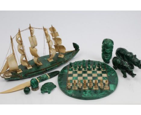 Collection of carved malachite objects, to include malachite miniature chess set, malachite and bone model of a boat, models 