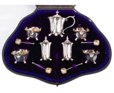 Late Victorian silver seven piece condiment set, comprising mustard of lobed form, with bead border, frosted glass liner, scr