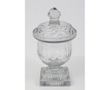 George IV cut glass sweet jar and cover with diamond and slice cut decoration, raised on stepped square lemon-squeezer base, 