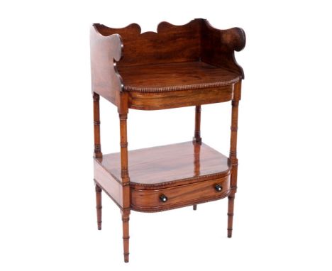 Regency mahogany, rosewood crossbanded and brass strung two tier washstand in the manner of Gillows, with shaped three-quarte
