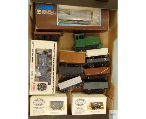 O GAUGE - A COLLECTION OF MOSTLY KIT BUILT WAGONS TOGETHER WITH A PAIR OF DIESEL LOCOS BY LIMA AND ATLAS - G/VG in F/G boxes 