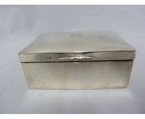 A silver mounted cigarette box, rectangular, Birmingham 1915, Makers Mark H M for Henry Matthews, 11.3cm max 