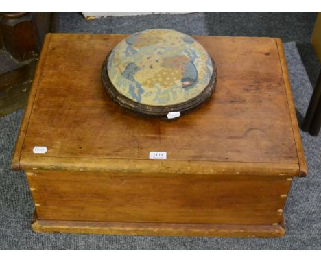 A pine trunk and a circular footstool 
