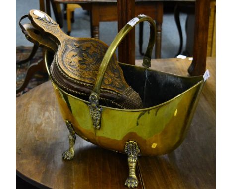 A George III circular tripod table, late 18th/early 19th century, raised on three cabriole legs, 45cm diameter; a pair of ear