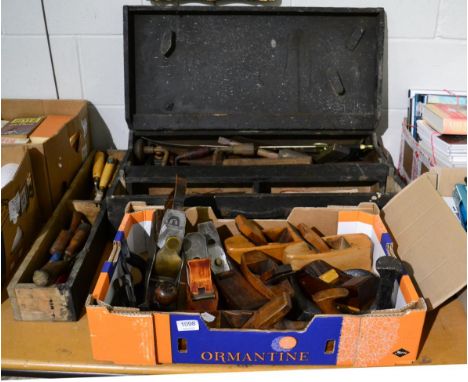 A tool chest, containing a large assortment of woodworking tools including planes, one steel marked Aaron Hildick, Sheffield;