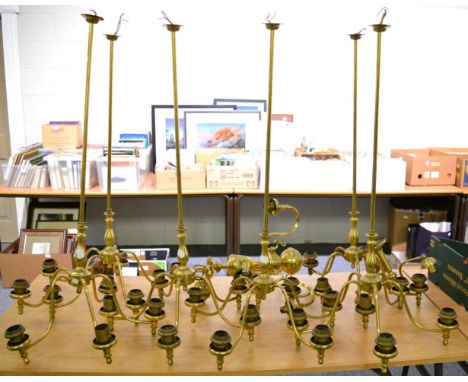 A group of six gilt metal ceiling light fittings together with two others and two boxes of shades 