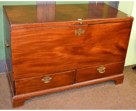 A George III mahogany mule chest, late 18th century, with hinged lid and brass carrying handles, with two deep drawers above 