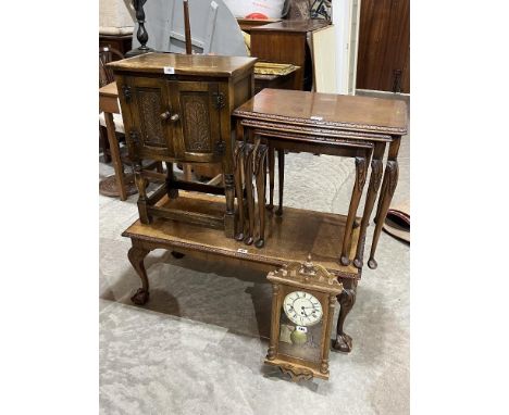 A small oak cabinet; a walnut low table; a wall clock and a nest of tables (4)