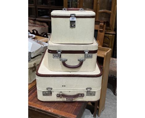 A set of three vintage cases