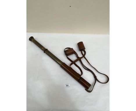 A Newbold and Bulford two draw Comet field telescope with brass and leather tubes. 23¼' long extended
