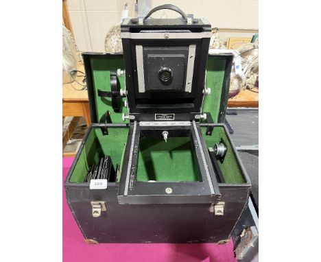 A Kodak specialist camera, model 2 4x5. Together with a vintage projector 