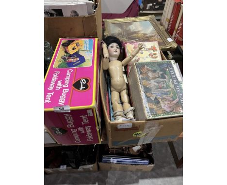 A collection of vintage toys including a Sindy camping buggy
