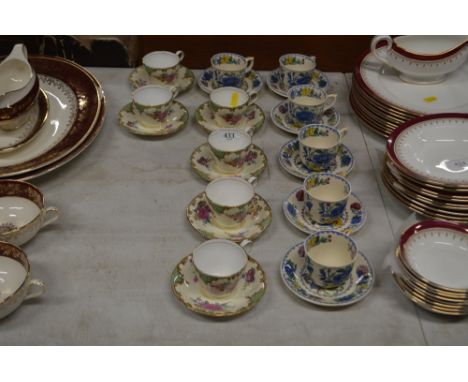 A set of six Aynsley decorated coffee cups and saucers and Masons Regency coffee cups and saucers