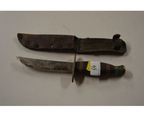 A hunting knife and an eastern sword