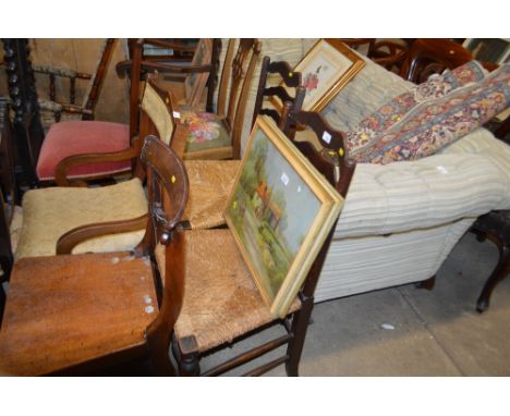 Three oak ladder back and rush seated chairs and a mahogany dining chair