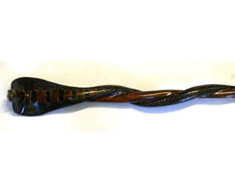 A 20th century hand painted and lacquered Chieftain Staff walking stick
Possibly West African, modelled in the form of a cobr